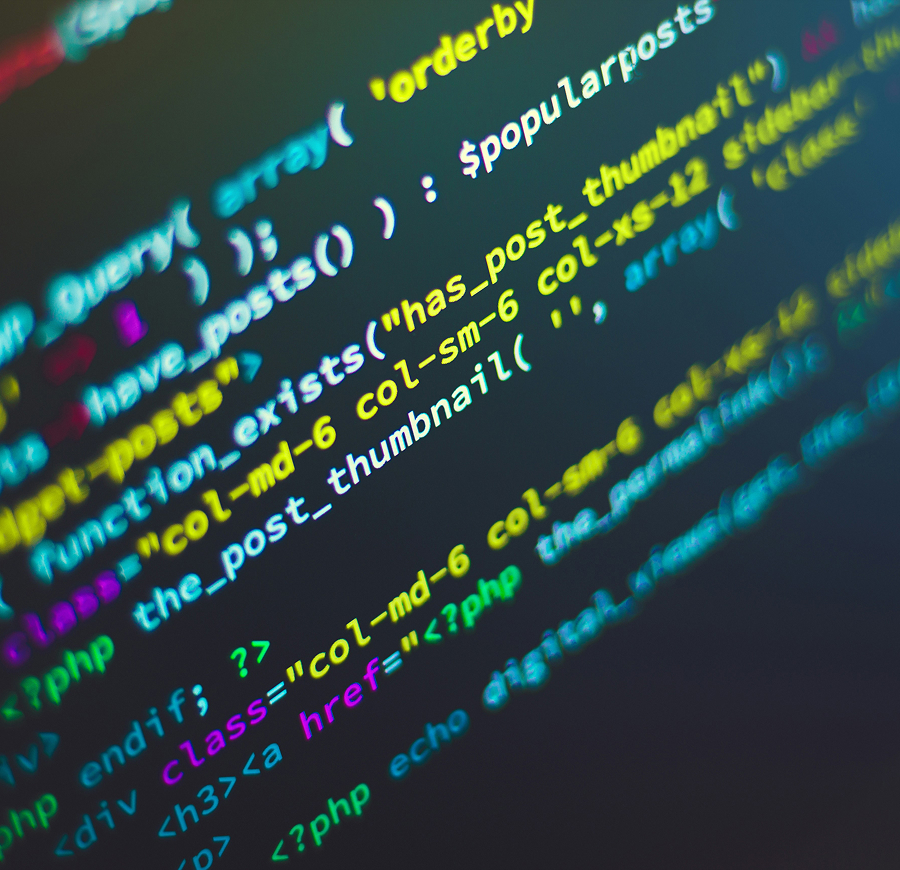 Close-up photo of PHP code and HTML markup on a screen